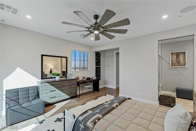 bedroom featuring ceiling fan and light wood-type flooring