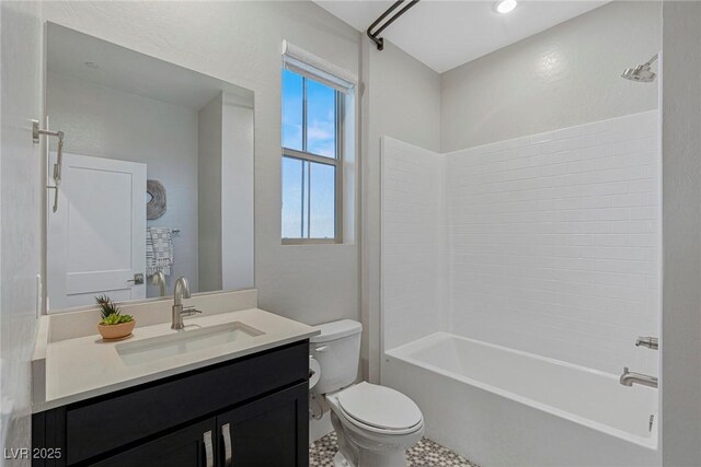 full bathroom featuring toilet, vanity, and shower / bathtub combination