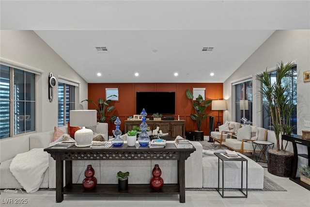 living room with lofted ceiling