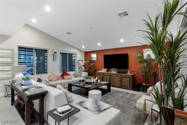 living room with lofted ceiling