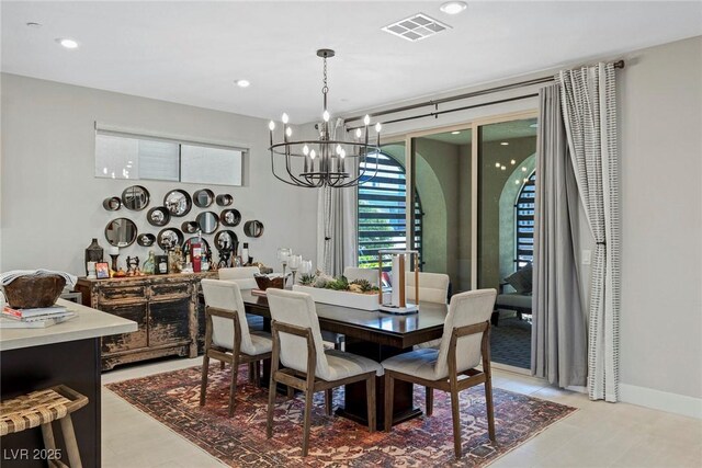 dining area with a chandelier