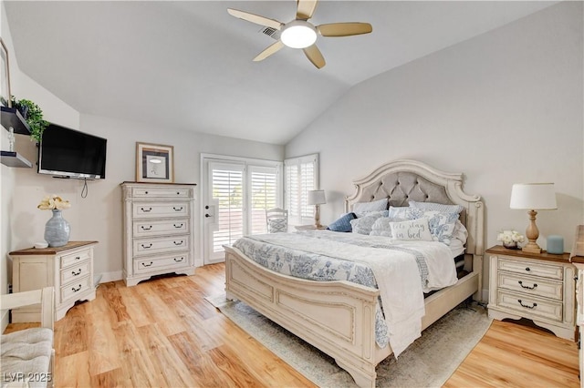 bedroom featuring access to outside, ceiling fan, vaulted ceiling, and light wood-type flooring