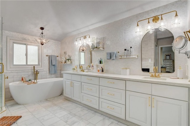 bathroom featuring vanity and a bathtub