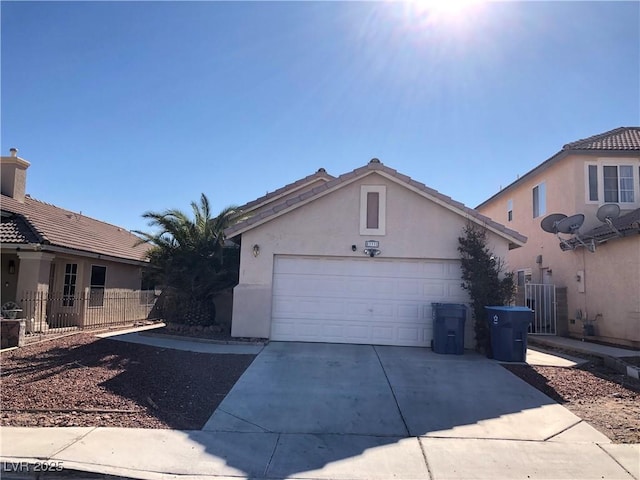 view of property exterior featuring a garage