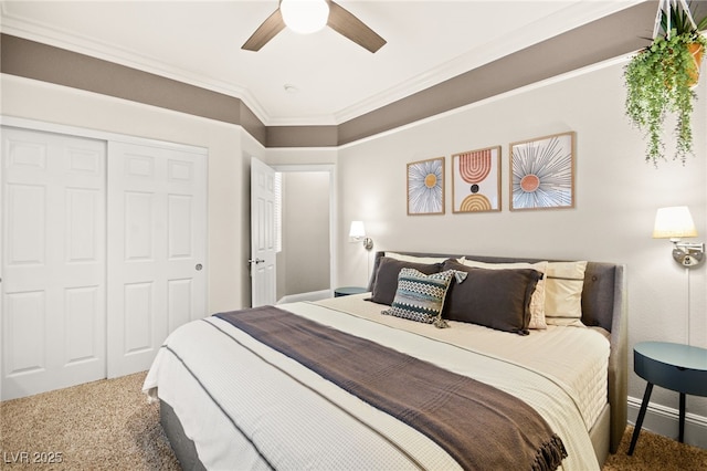 bedroom featuring a closet, ceiling fan, ornamental molding, and carpet floors