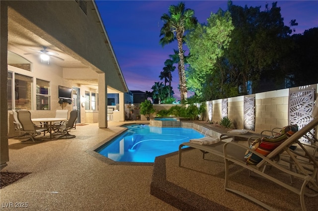 view of pool featuring a patio area and ceiling fan