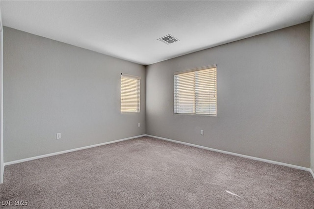 view of carpeted spare room