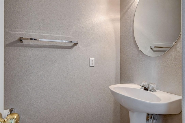 bathroom featuring sink