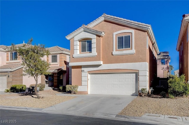 view of front of property with a garage