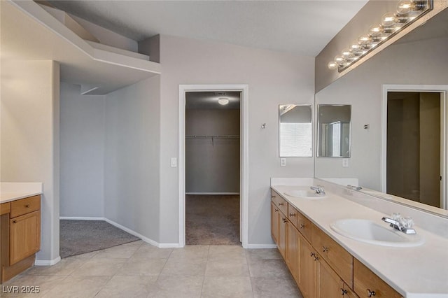 bathroom with vanity and tile patterned floors