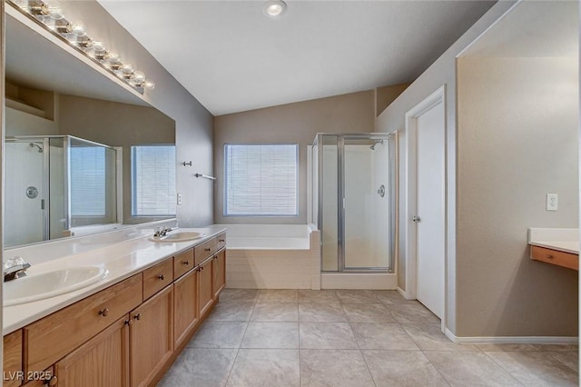 bathroom with lofted ceiling, vanity, separate shower and tub, and tile patterned floors