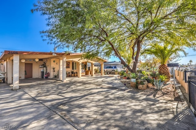 back of property with a patio