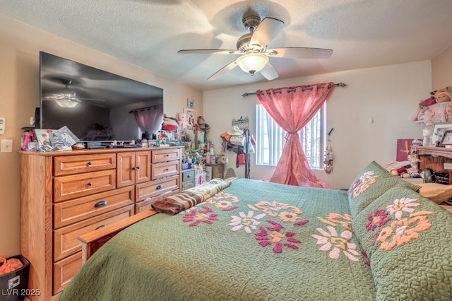 bedroom featuring a textured ceiling and ceiling fan