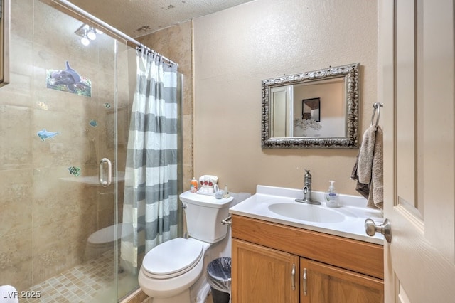 bathroom with toilet, a textured ceiling, curtained shower, and vanity