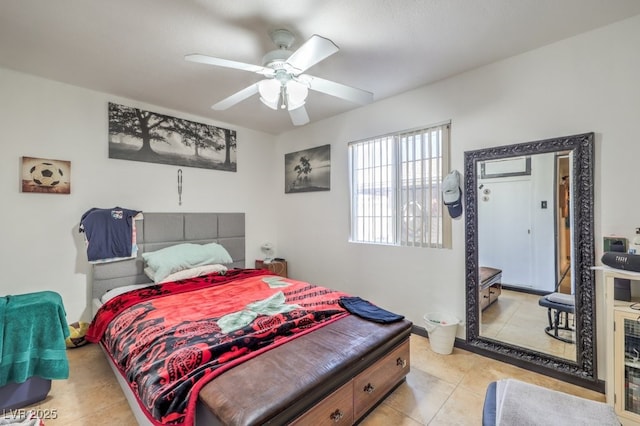 bedroom featuring ceiling fan and light tile patterned floors