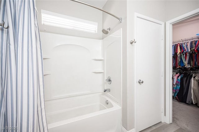 bathroom with shower / tub combo