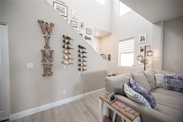 living room with light hardwood / wood-style flooring