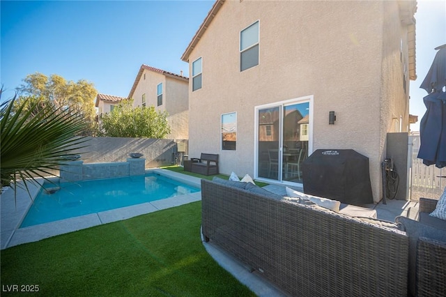 view of pool with a yard and outdoor lounge area