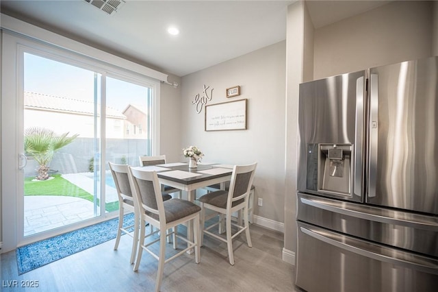 dining area featuring light hardwood / wood-style floors