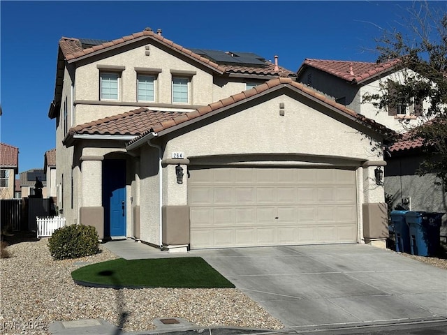 view of front facade featuring solar panels and a garage