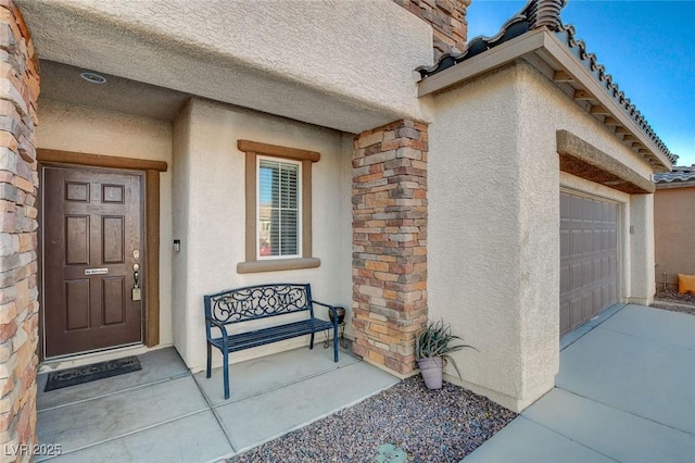 property entrance featuring a garage