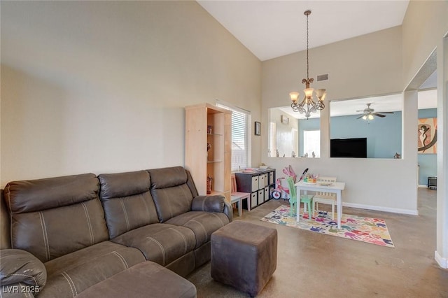 living room featuring high vaulted ceiling and ceiling fan with notable chandelier