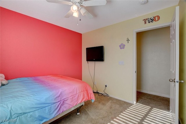 bedroom featuring ceiling fan and light colored carpet