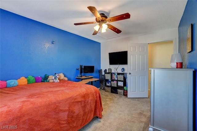 bedroom featuring ceiling fan and light colored carpet