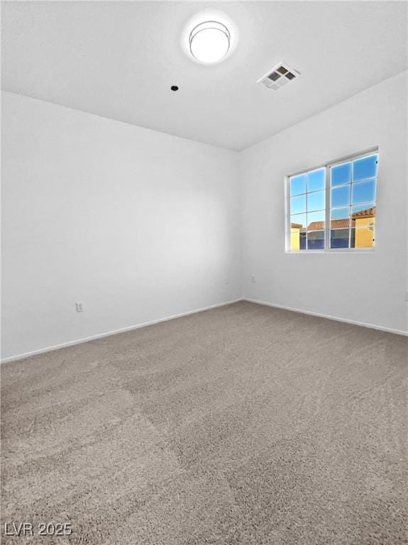 empty room with carpet flooring