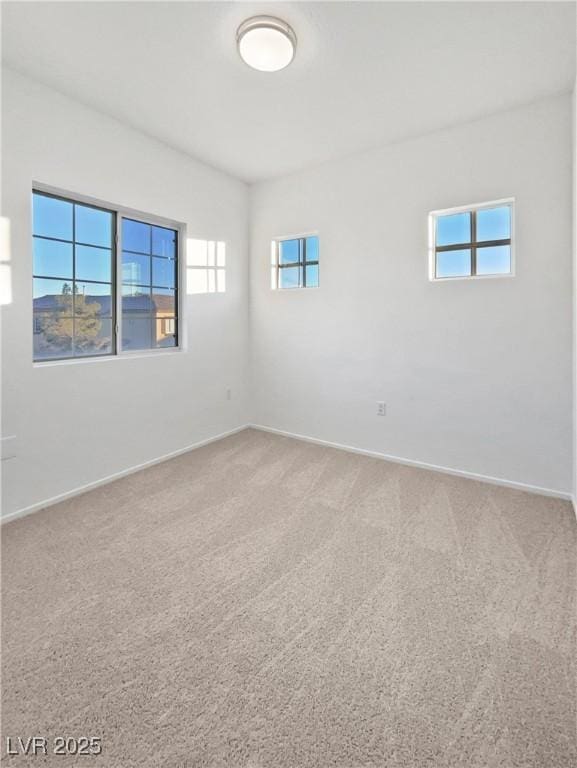 view of carpeted spare room