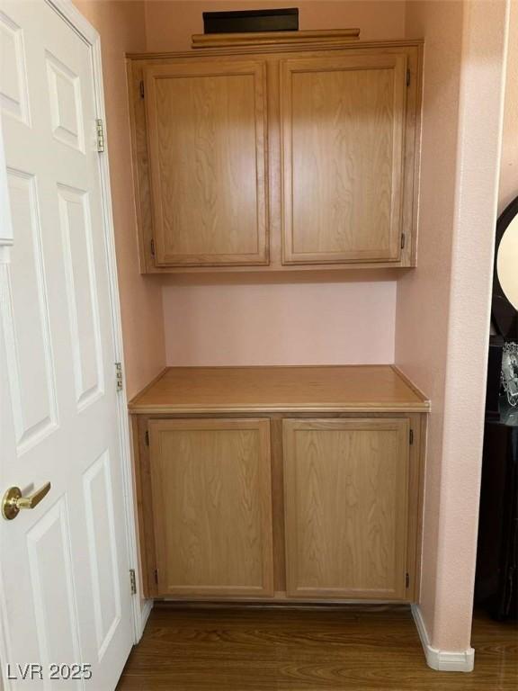 interior space with hardwood / wood-style flooring