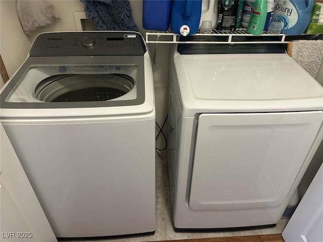 laundry area with washer and dryer