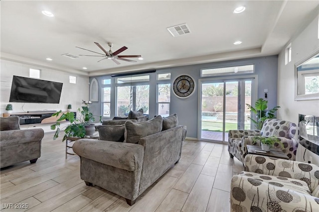 living room with ceiling fan