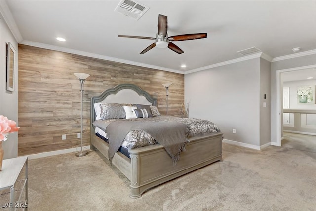 bedroom featuring light colored carpet, ceiling fan, wooden walls, and crown molding