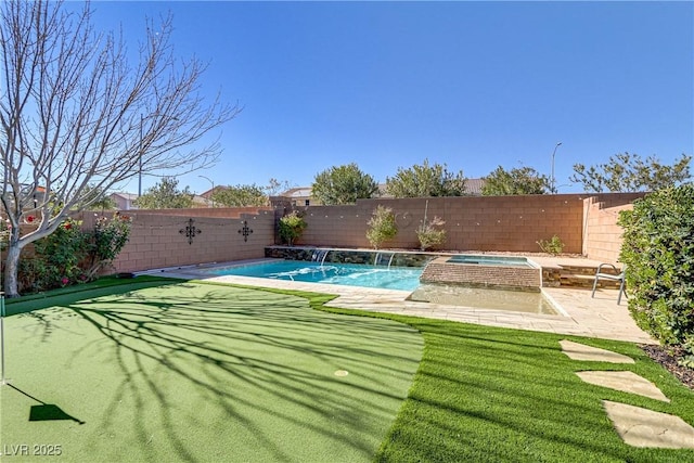 view of swimming pool with pool water feature, a patio area, and an in ground hot tub