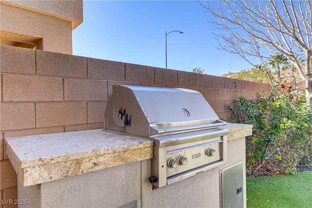 view of patio / terrace with a grill and area for grilling