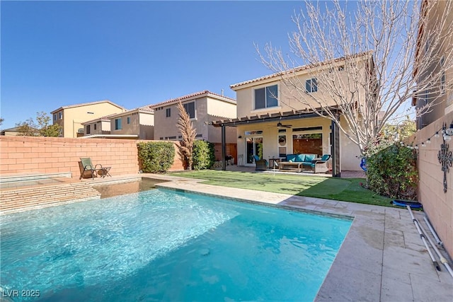 view of pool with outdoor lounge area and a patio