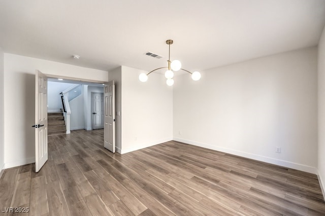 unfurnished dining area with dark hardwood / wood-style floors