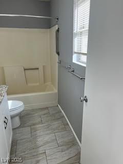 full bathroom featuring vanity, toilet, and shower / bathing tub combination