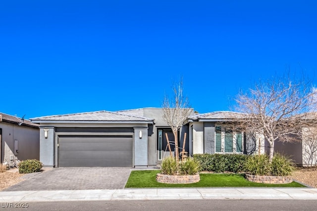 single story home featuring a garage