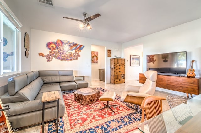 living room featuring ceiling fan