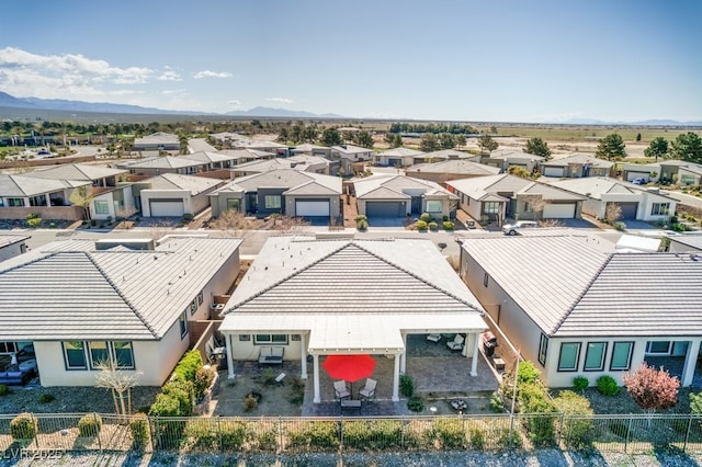 drone / aerial view featuring a mountain view