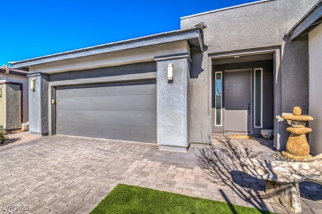 property entrance featuring a garage