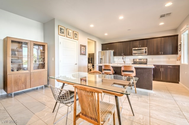 dining space with sink