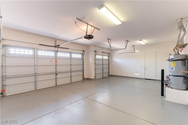 garage featuring secured water heater and a garage door opener