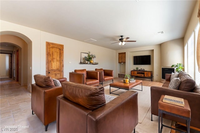 living room featuring ceiling fan