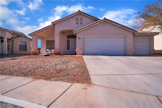 view of front of property featuring a garage