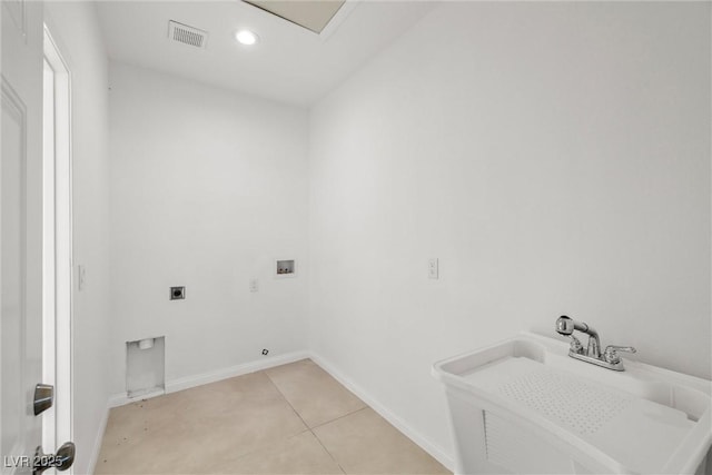 laundry area featuring hookup for an electric dryer, sink, hookup for a washing machine, light tile patterned flooring, and gas dryer hookup