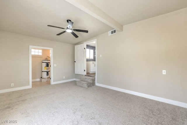 unfurnished bedroom featuring beam ceiling, ceiling fan, and secured water heater