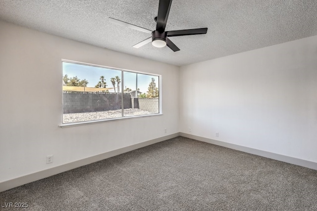 unfurnished room with a textured ceiling and ceiling fan